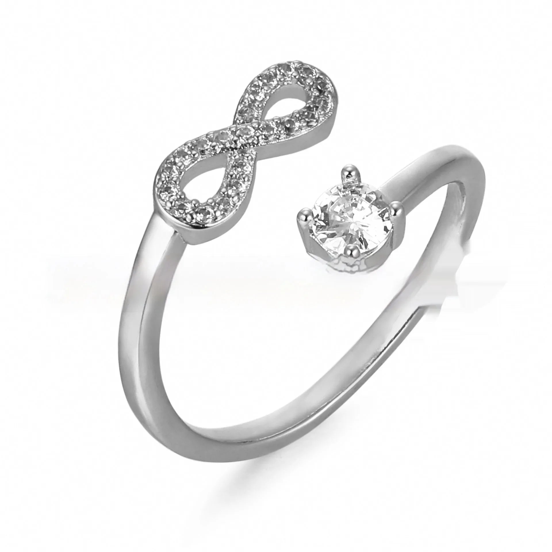 Geometric personality ring with engraved letter and inlaid zircon stones in metallic finish