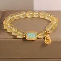 Women's natural yellow citrine crystal bracelet with rhinestone decorative accents