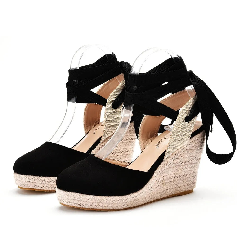 Women's apricot bohemian wedge sandals with bead decorations, tassels, and a buckle fastener on a white background.