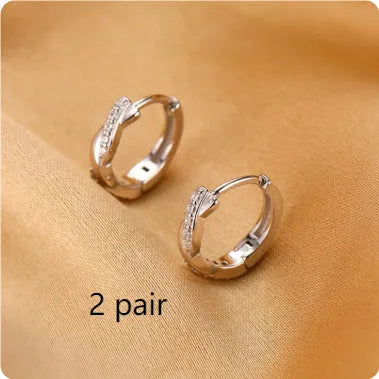 Geometric interwoven hemp rope earclip earrings for women in gold and silver colour options.