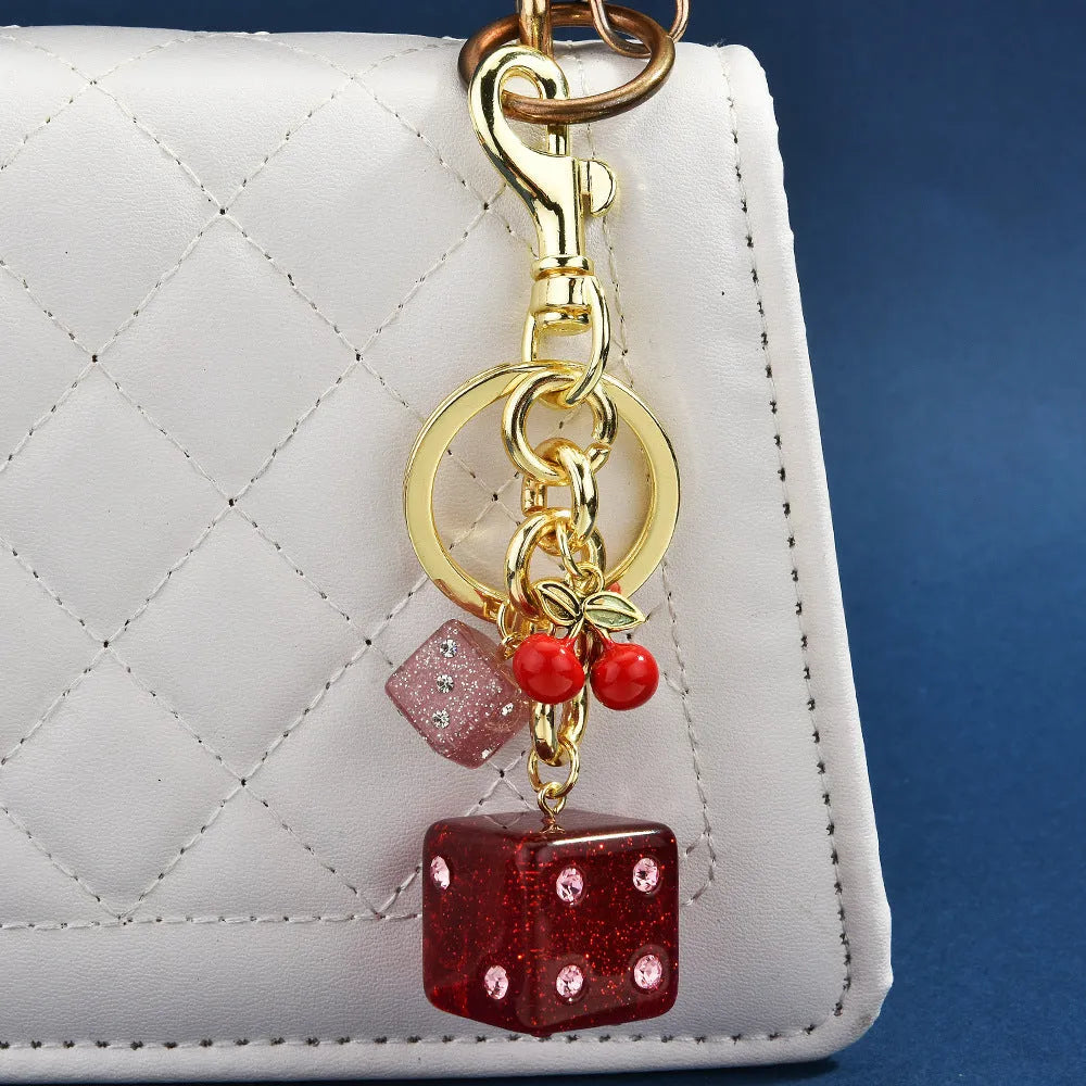 Square metal dice bag keychain pendant with cherry two-tone electroplated finish