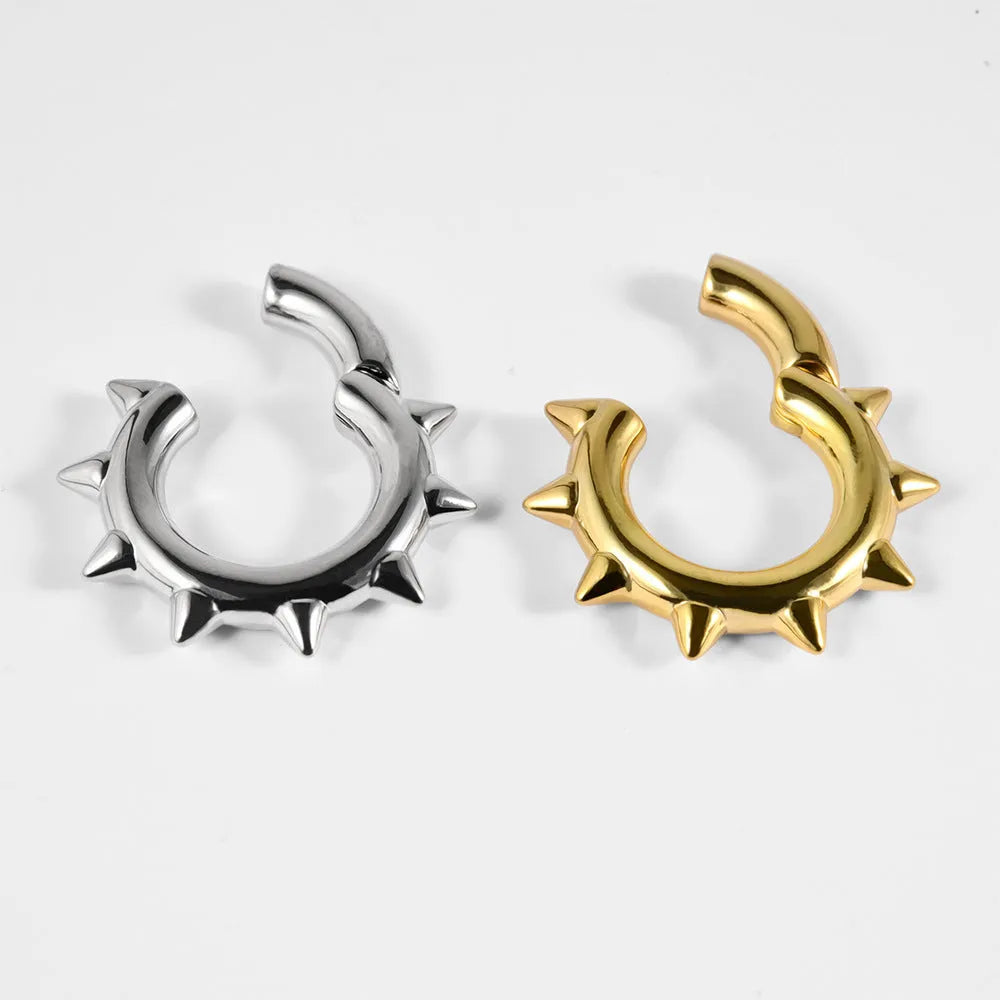 A pair of copper geometric cone-shaped earring extenders with a magnet closure, shown in one of eight available style finishes.