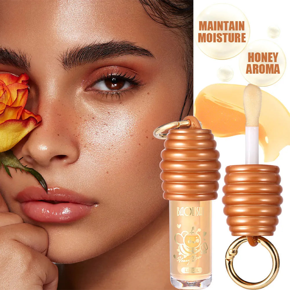 Portable honey lip gloss in keychain pannier bag with moisturising properties