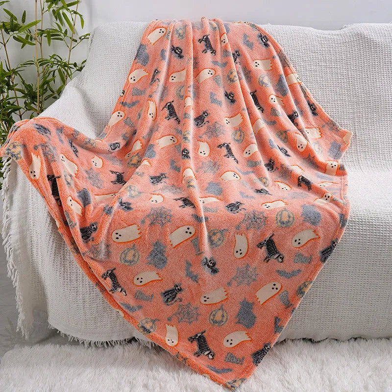 Colourful cartoon-pattern flannel blanket for children, shown in two size options.