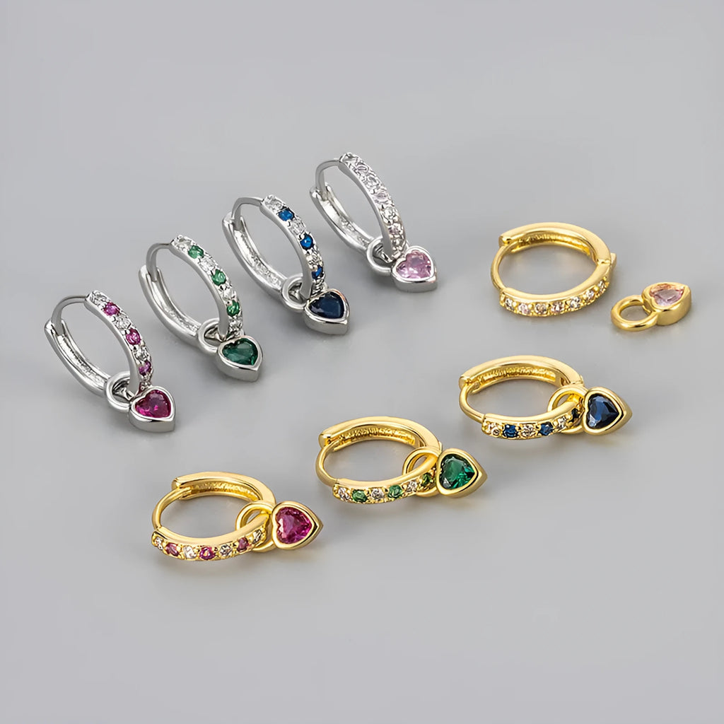 Women's zircon earrings with heart-shaped drops in gold or white gold settings with coloured gemstones