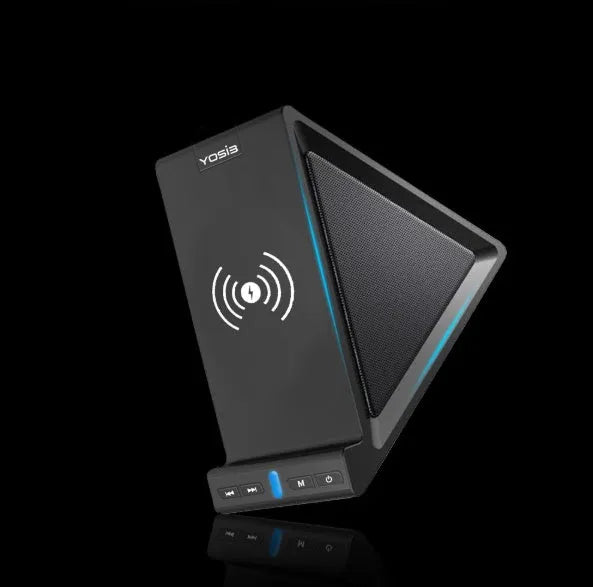 Black multifunctional Bluetooth speaker with integrated wireless charging base and phone stand.