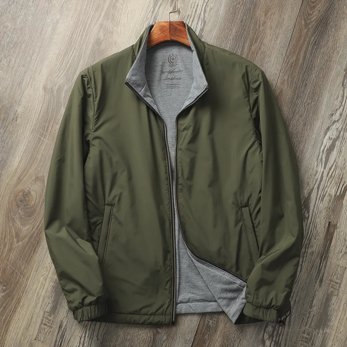 Men's stand collar casual jacket in army green with a simple design and regular sleeves.