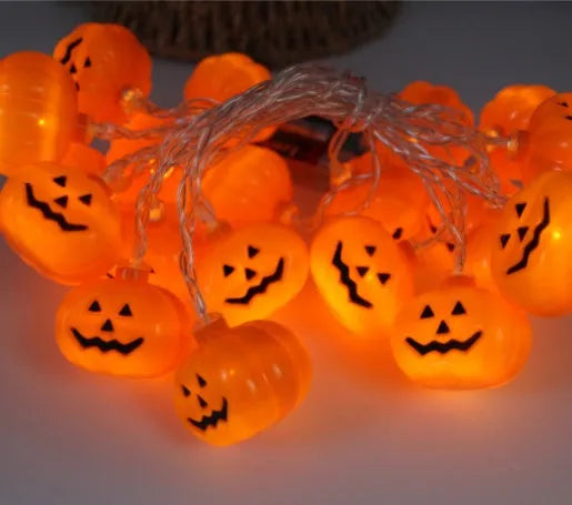 Halloween LED string lights with pumpkin, bat and ghost decorations showing colour changing illumination