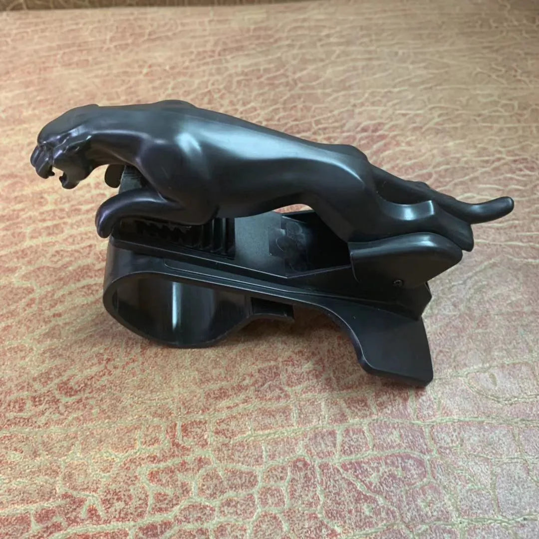 Car Leopard rotating mobile phone bracket in black ABS plastic mounted on dashboard