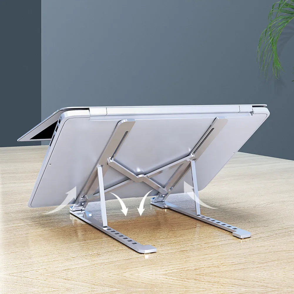 Portable aluminum laptop stand folded and unfolded, showing adjustable height and silver colour