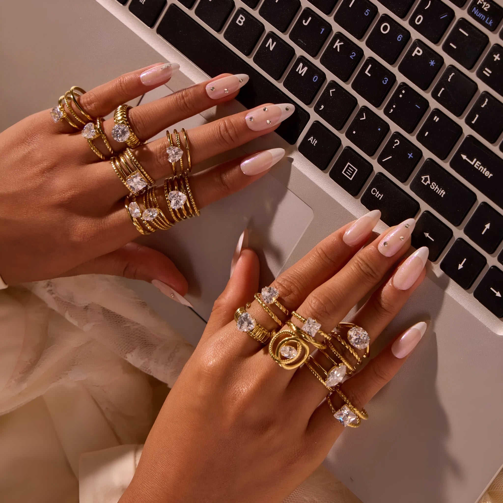 Gold electroplated stainless steel ring with zircon geometric designs and open mouth adjustable fitting