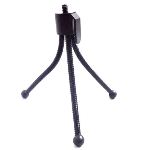 Compact black iron frame mini desktop tripod with a ball head, shown folded and extended next to a smartphone.