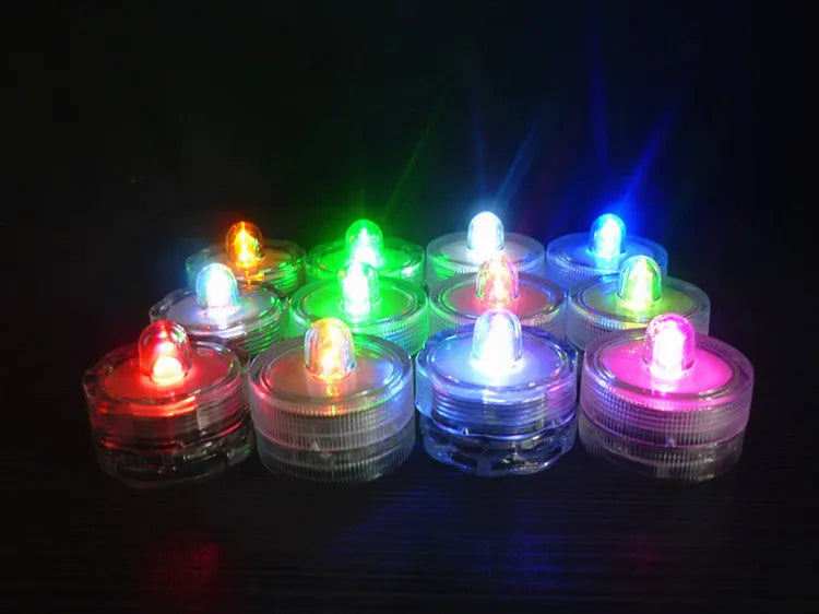 Set of colourful electronic candle lights with CR2032 battery, submersible, 3cm diameter, 2.6cm height, plastic housing