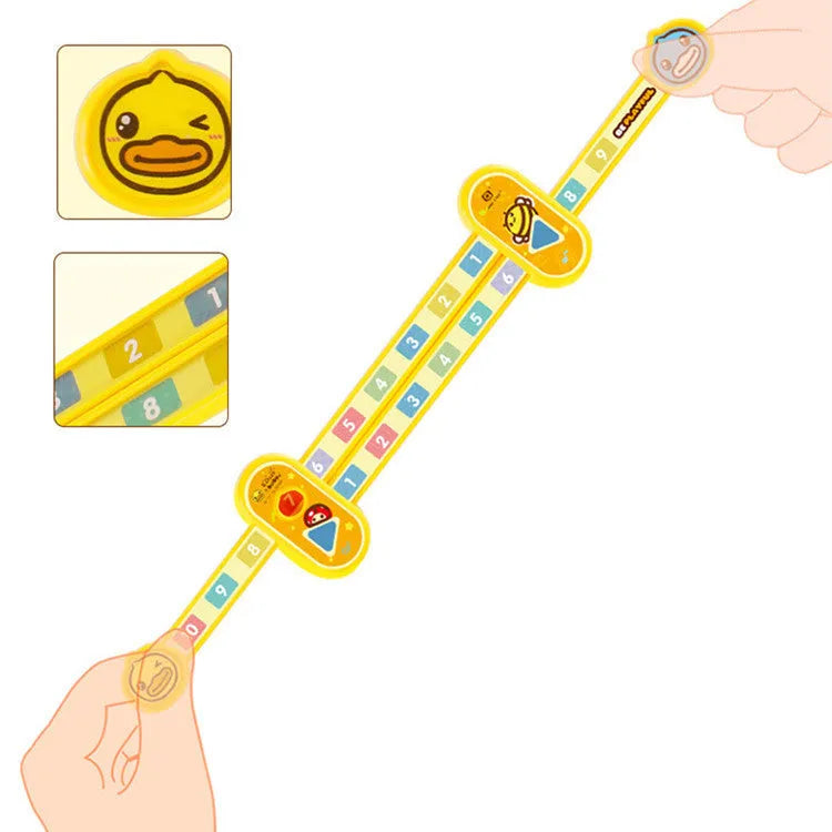Yellow plastic decomposition ruler for children showing measurement scale and number markings