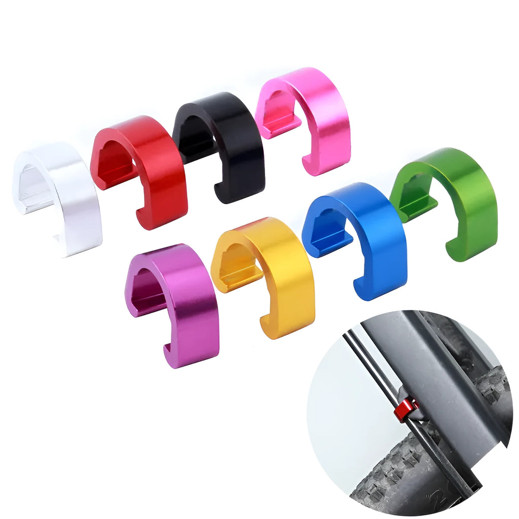 Set of aluminium alloy C buckles in various colours on a white background.
