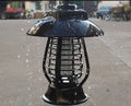 White and purple solar-powered mosquito lamp for outdoor garden use with solar panel and LED lights