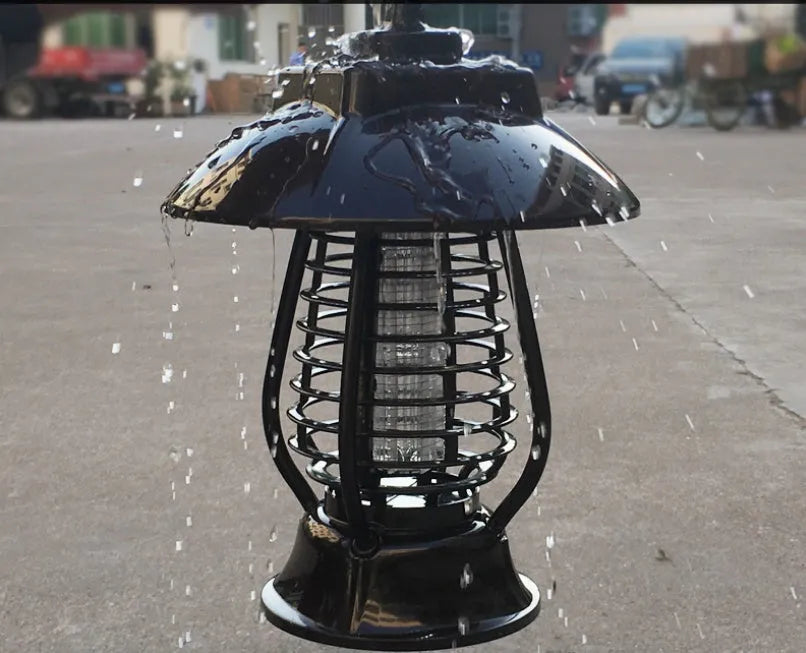 White and purple solar-powered mosquito lamp for outdoor garden use with solar panel and LED lights