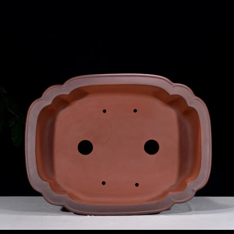 Antique finish Chinese style purple clay rectangular flowerpot measuring 71cm long, 54cm wide, and 23cm high.