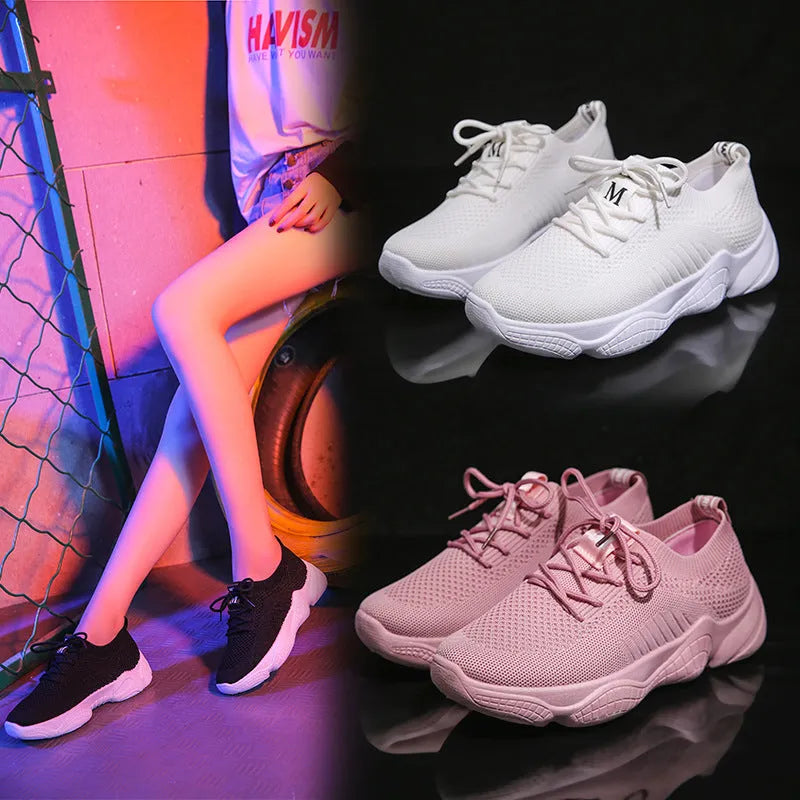 Women's white thick-soled casual trainers with woven upper and front strap design