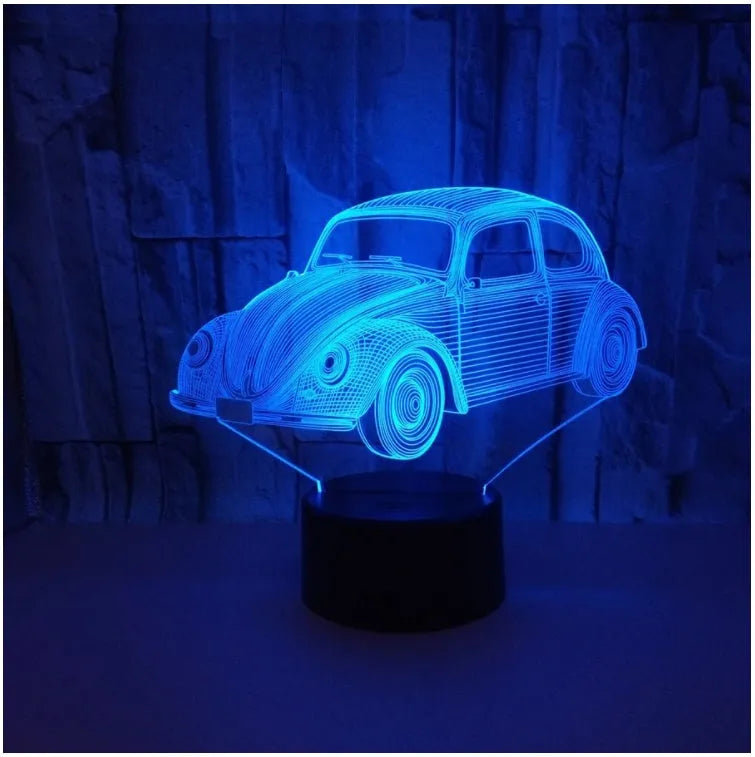 Black acrylic LED table lamp with remote control on wooden desk