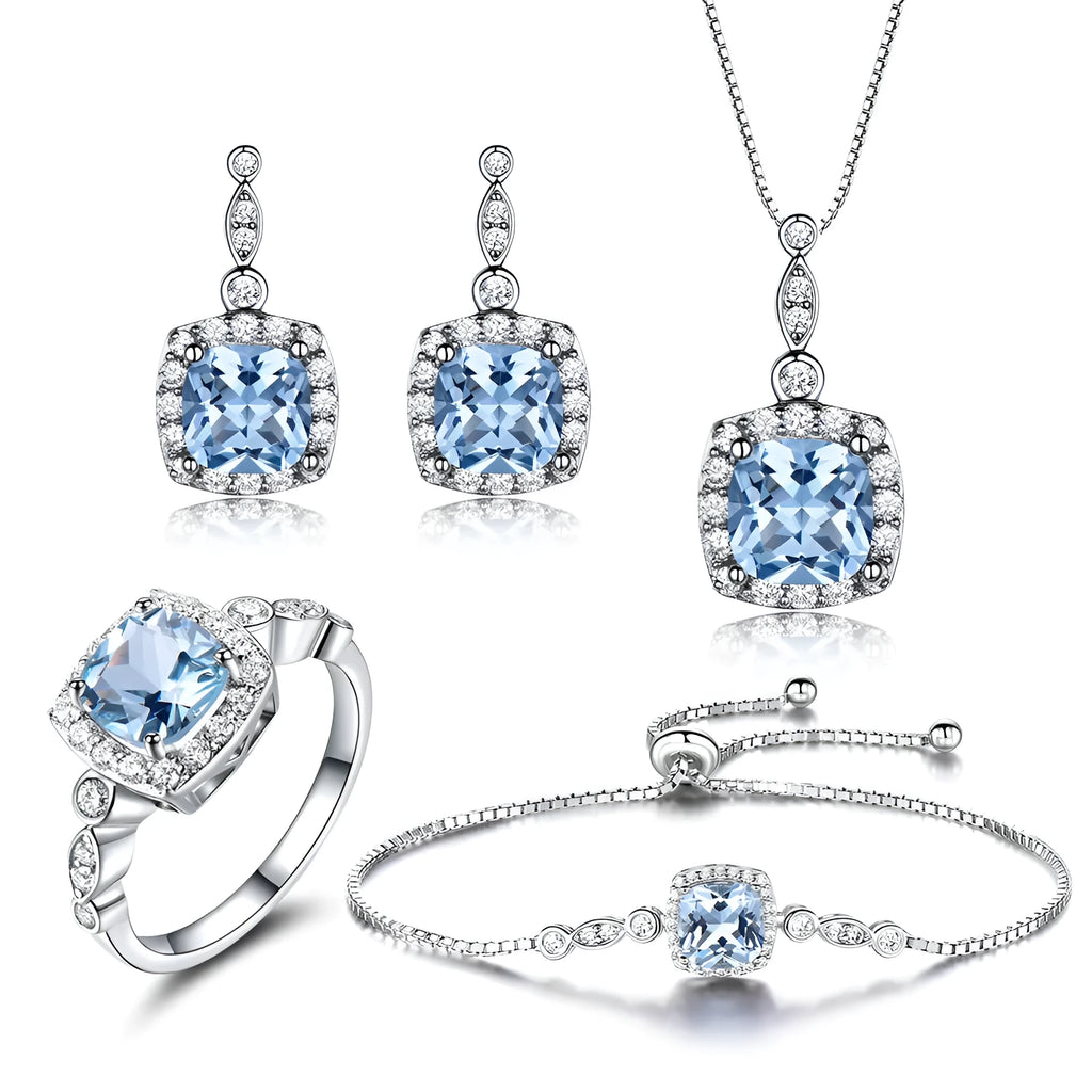 925 sterling silver jewellery set with sky blue topaz stones, including necklace, bracelet and earrings