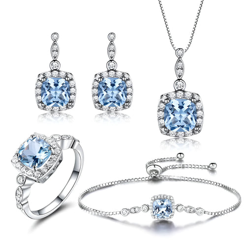 925 sterling silver jewellery set with sky blue topaz stones, including necklace, bracelet and earrings