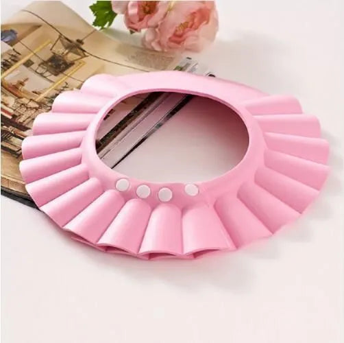 Adjustable waterproof EVA baby shower cap in blue with ear detail, 29x26cm