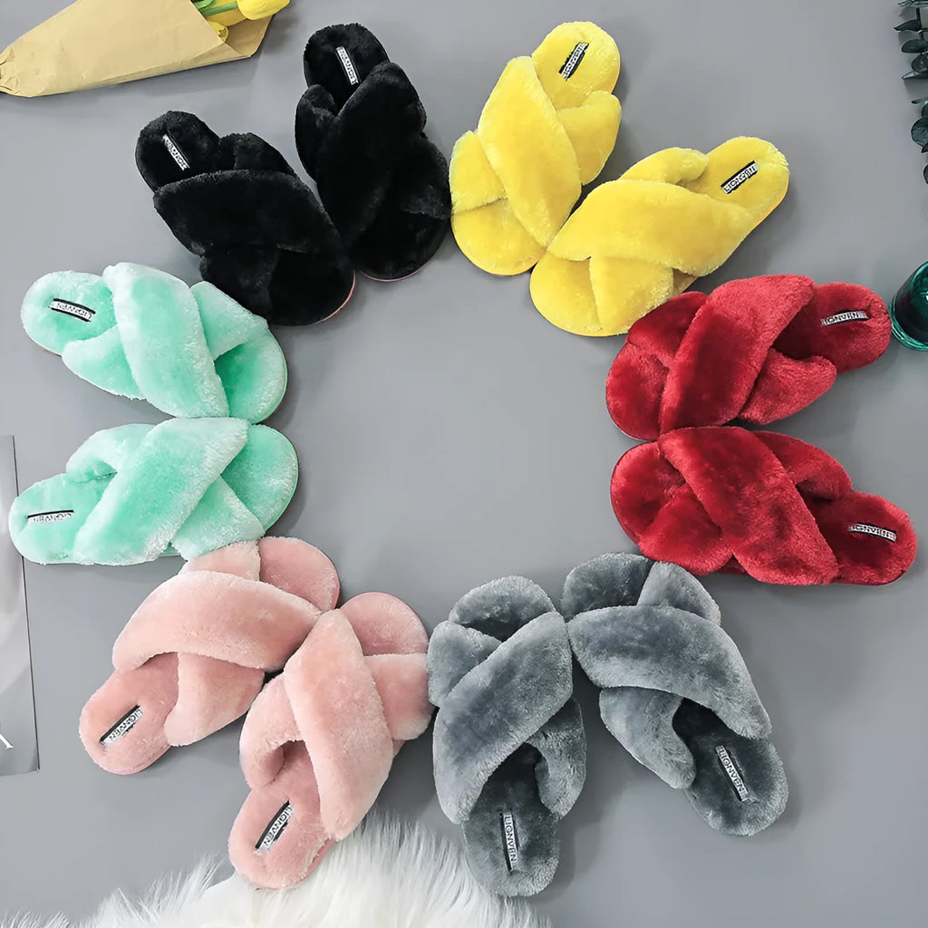 Cross open-toe fur slippers in multiple colours showing fur lining and patterned non-slip sole.