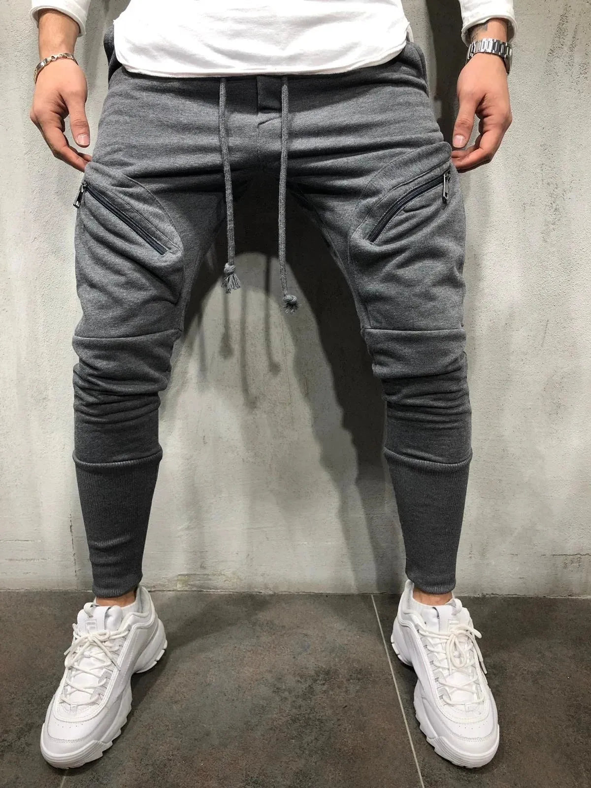 Men's cotton blended micro-elastic zipper casual trousers in black, tapered leg style