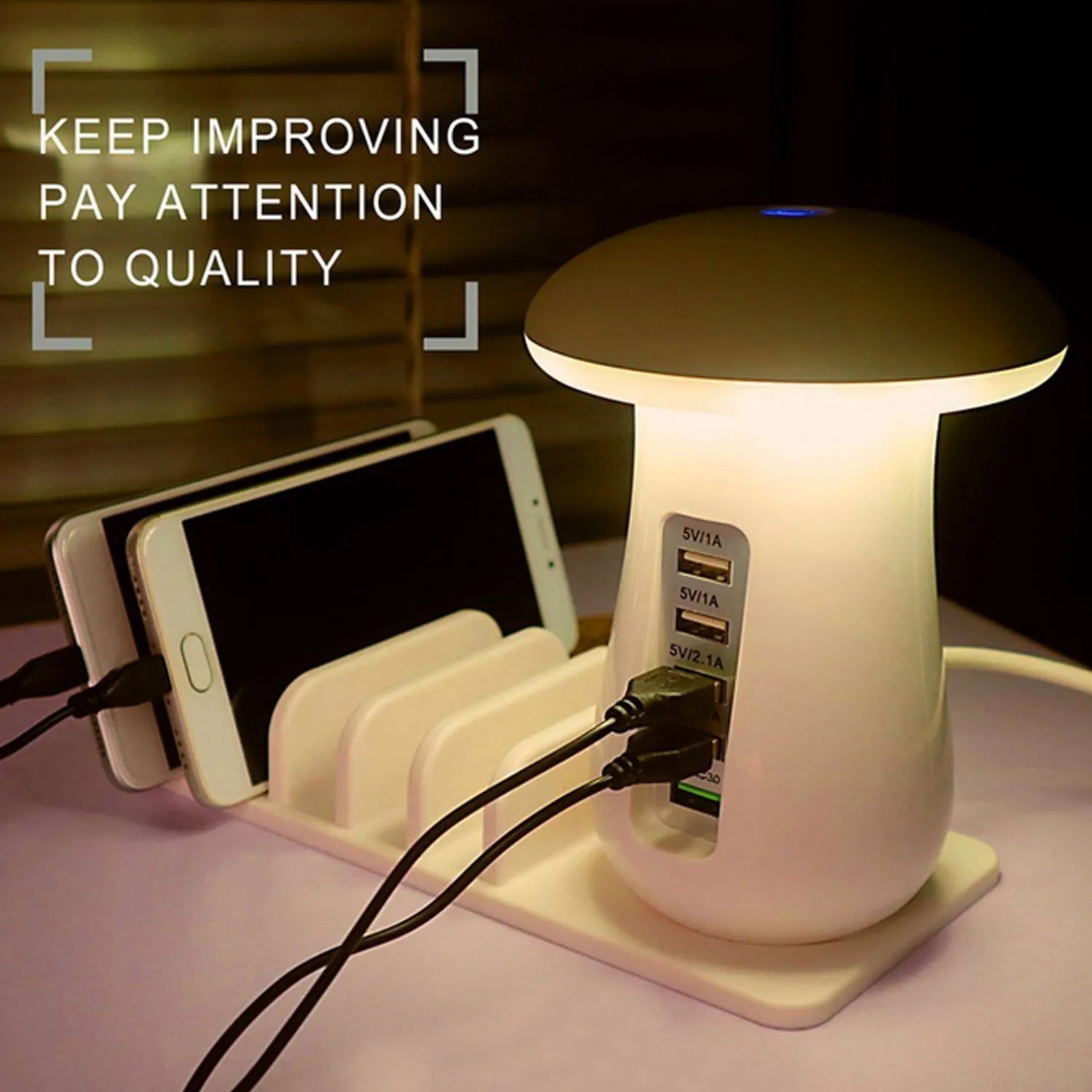 White mushroom-shaped LED desk lamp with 5 USB charging ports at its base on a wooden table.