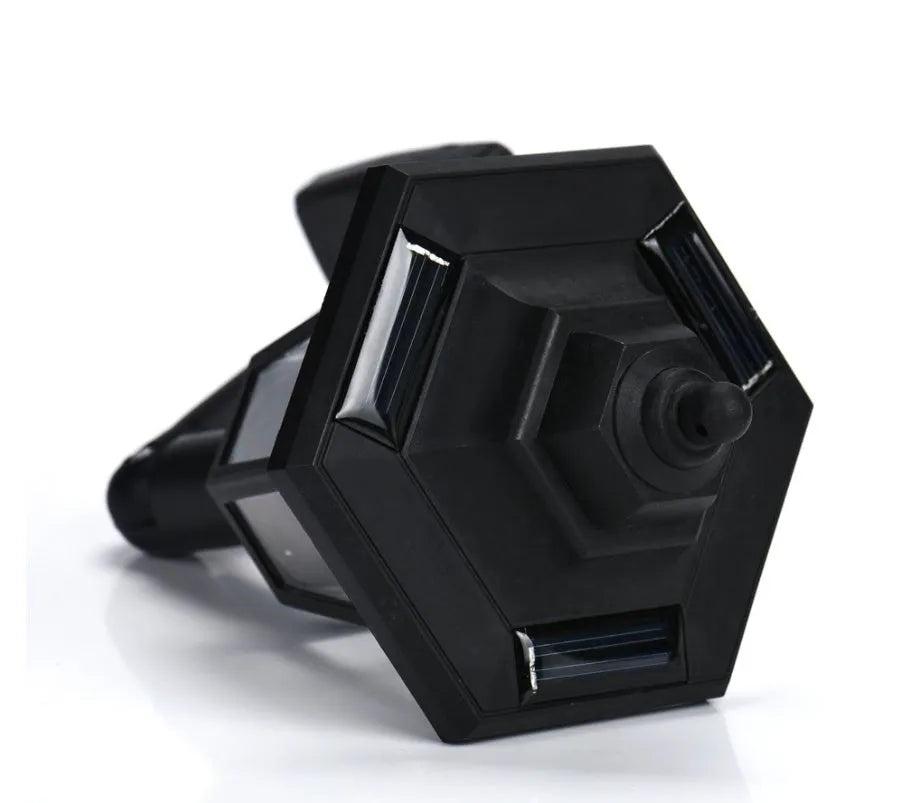 Black hexagonal solar-powered outdoor wall light with a visible solar panel and LED.