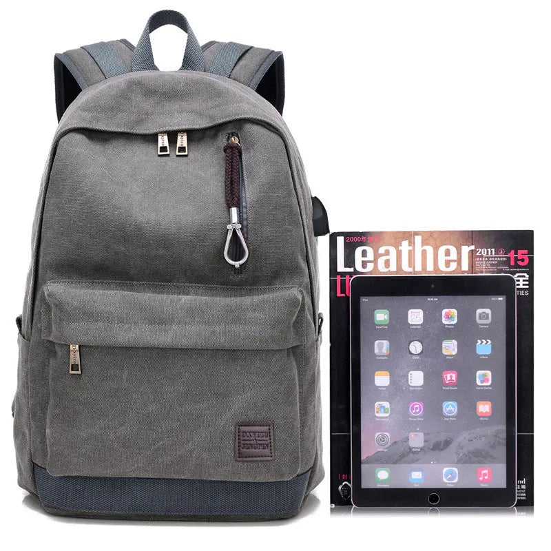 Canvas shoulder backpack with USB charging port in coffee colour showing computer pocket and main compartment