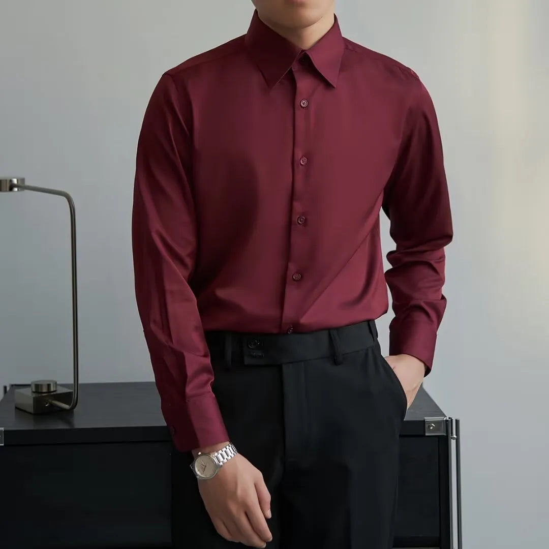 Man wearing a black long sleeve Korean style cardigan shirt with a loose fit and Japanese retro design details.