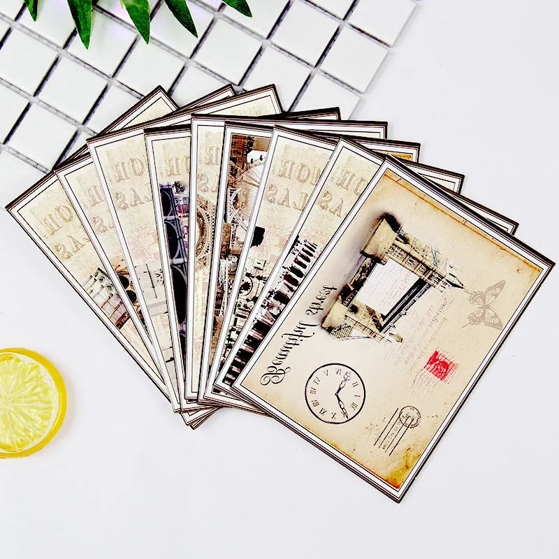 Set of nine Japanese style postcards showing various designs including ink painting and cat illustrations.
