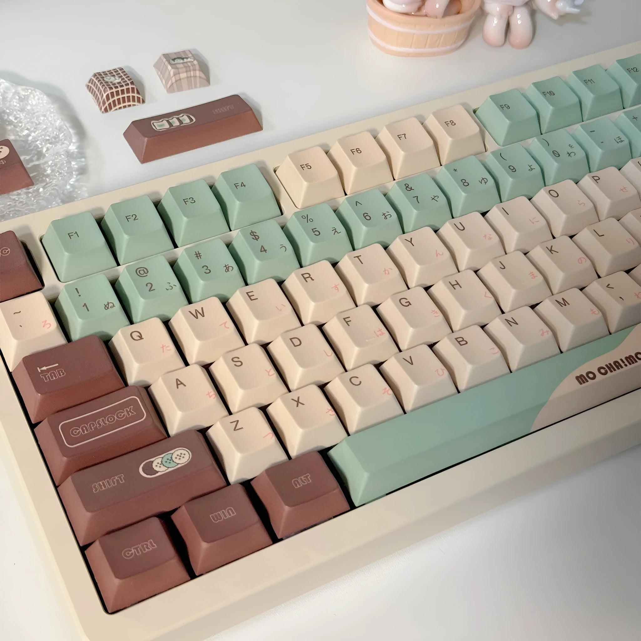 Matcha green mechanical keyboard keycap set with sublimation printing, shown with a key puller tool.