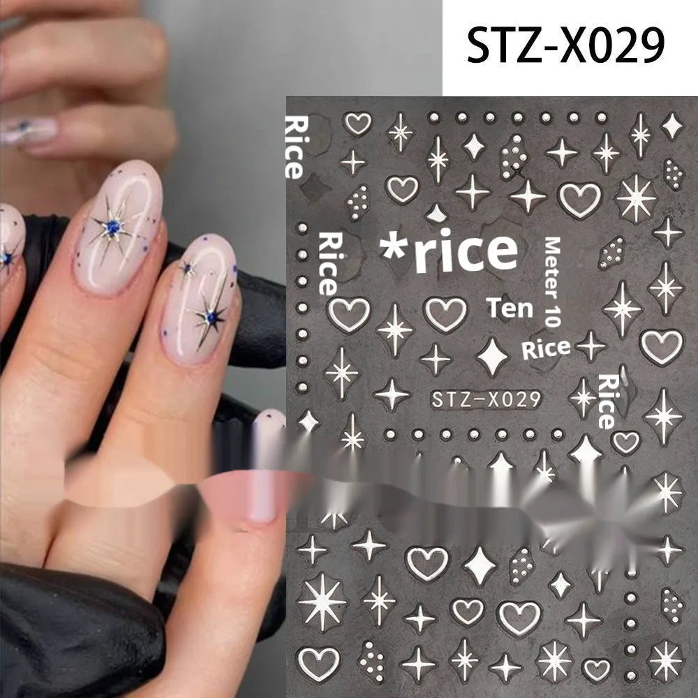 Pack of black and silver strip nail art stickers with cartoon and love pattern designs.