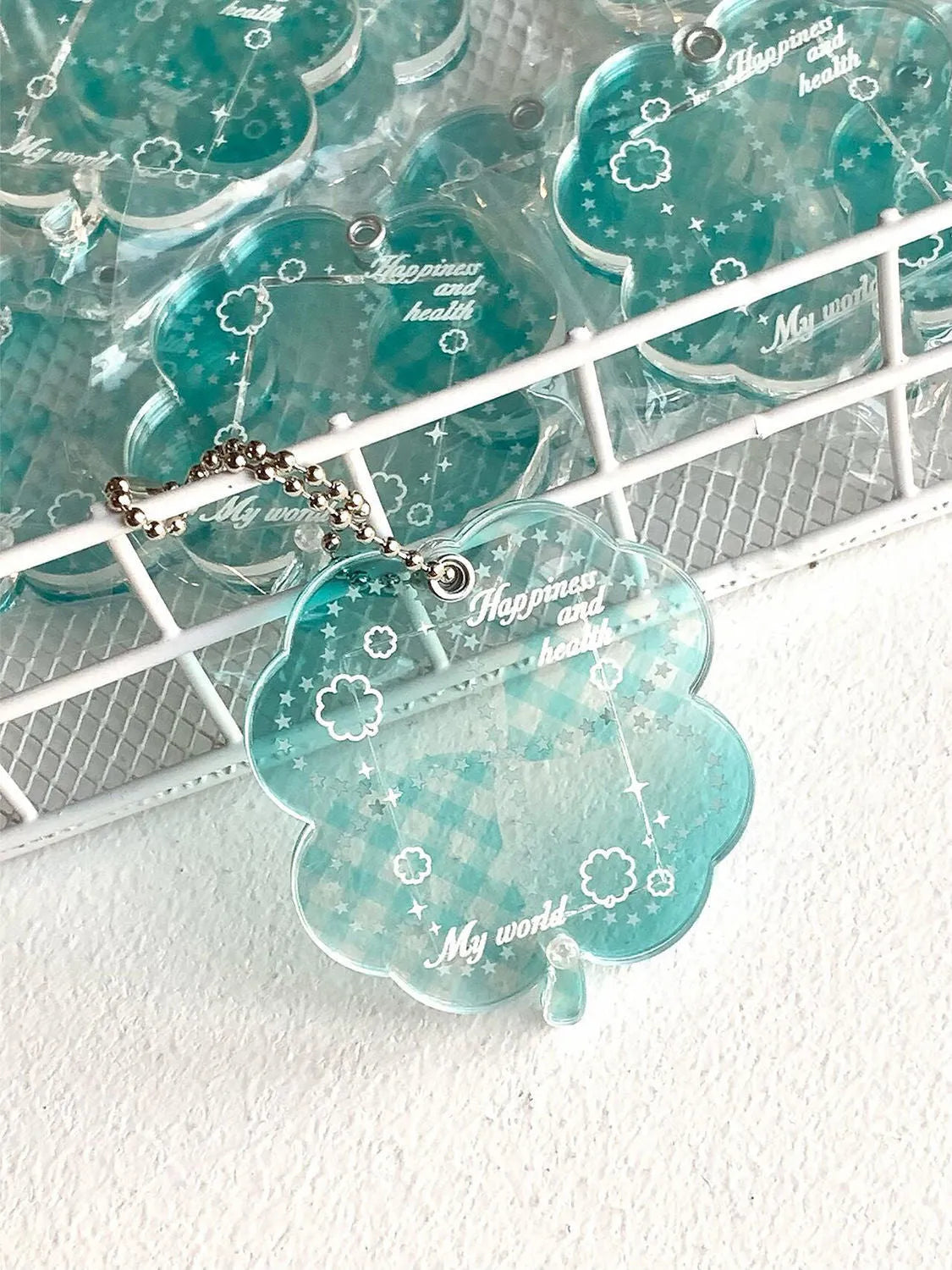 Acrylic four-leaf clover phone pendant keychain in blue and green colours
