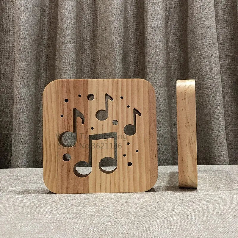 Square pine wood LED atmosphere lamp with warm white 3D illumination showing USB cable connection