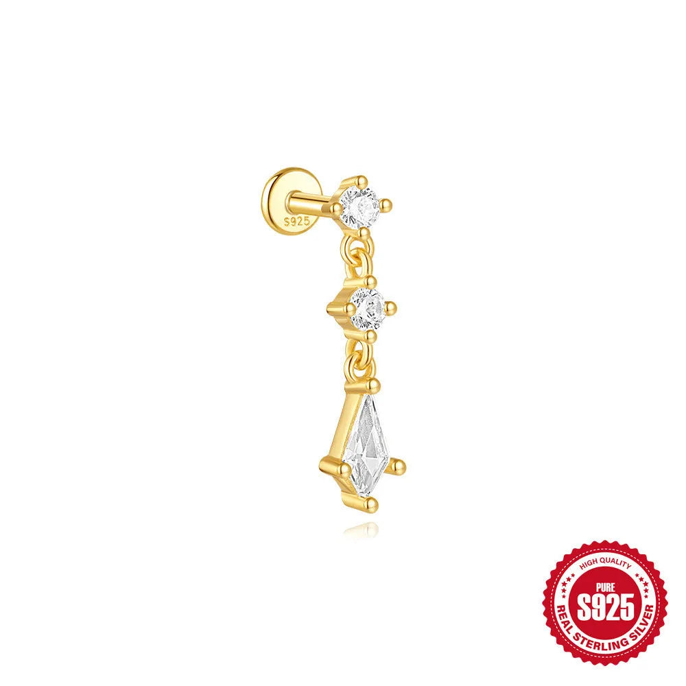 Geometric kite-shaped sterling silver stud earrings with rhinestones and a gold chain tassel.