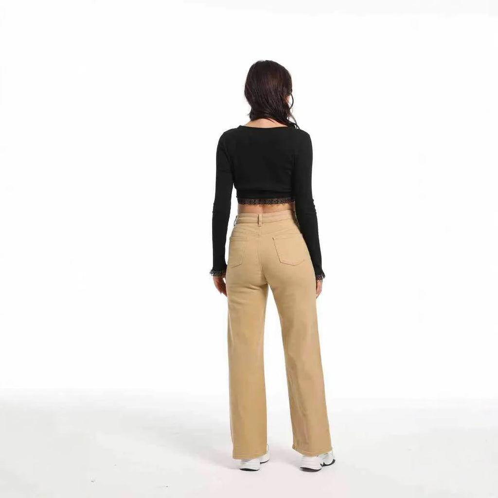 Women's apricot high-waist wide-leg cotton jeans laid flat showing straight leg cut.