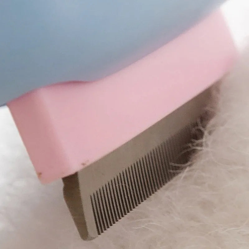 Blue double-sided pet grooming brush showing deshedding rake and dematting comb on a 195mm long handle.