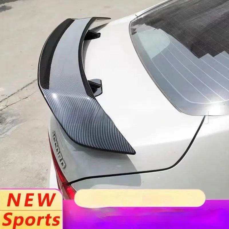 Universal punch-free ABS plastic car tail wing spoiler shown in carbon fibre pattern finish