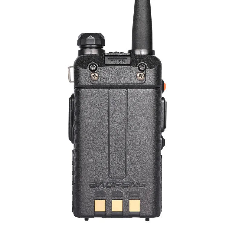Handheld VHF UHF walkie talkie radio showing compact dimensions and antenna