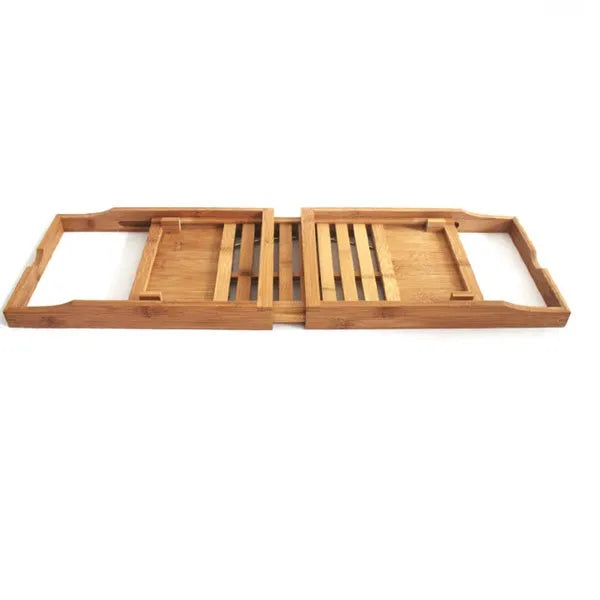 Bamboo bathtub frame shelf installed across tub edge for bathroom storage