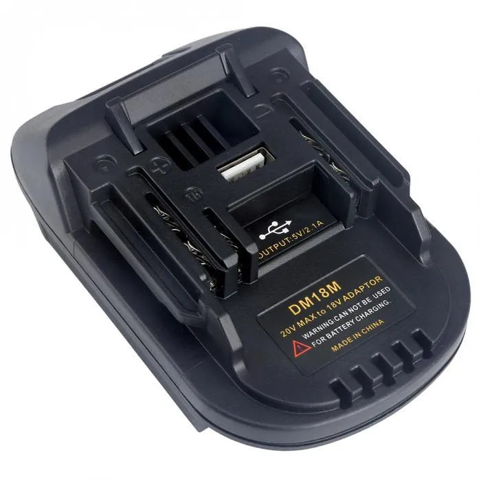 Black plastic battery adapter connecting Milwaukee DM18M tools to Makita H99F battery packs