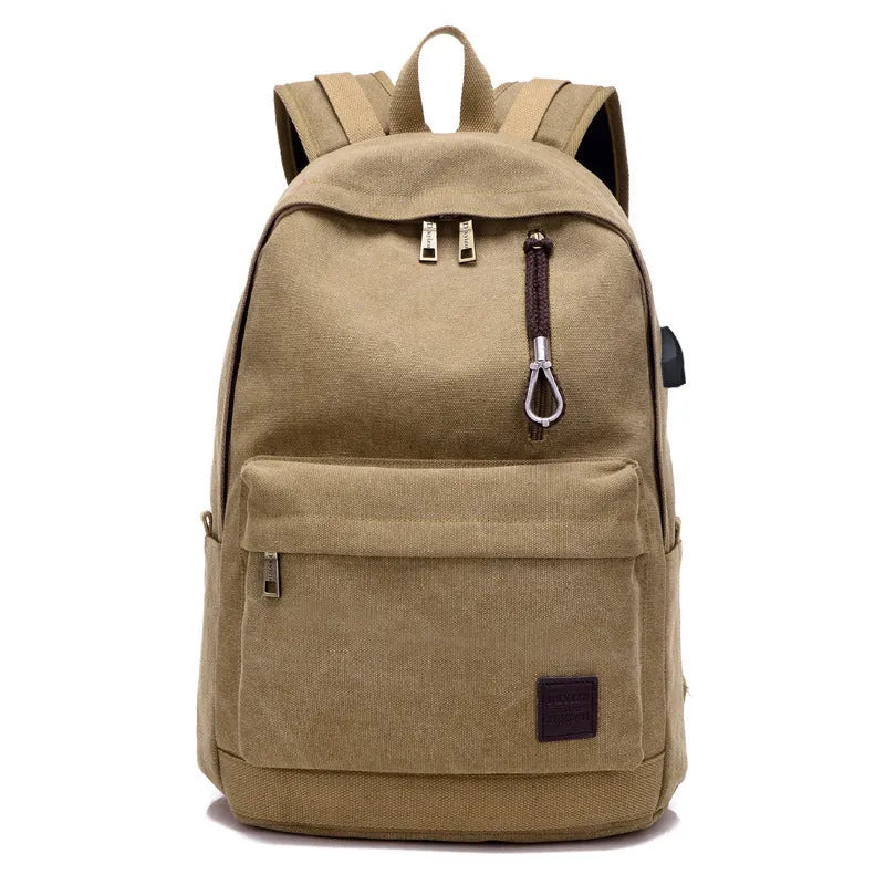 Canvas shoulder backpack with USB charging port in coffee colour showing computer pocket and main compartment