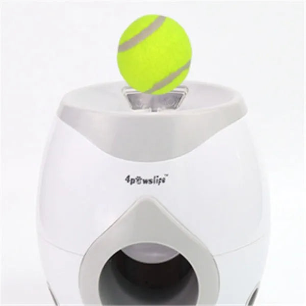 White plastic tennis food reward machine for interactive dog training with snack dispensing