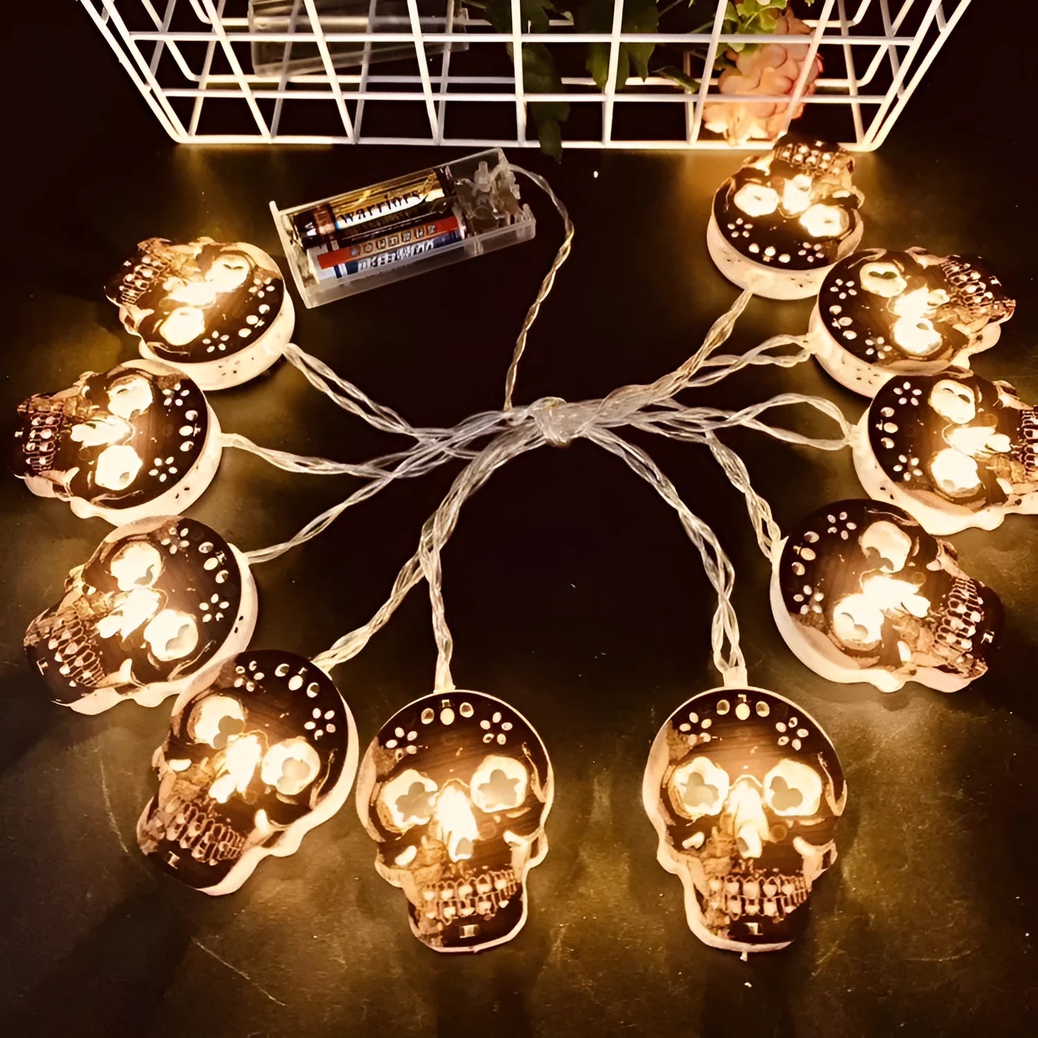 Skeleton-shaped Halloween decoration lights string, 1.5m with 10 warm white bulbs on a black cable