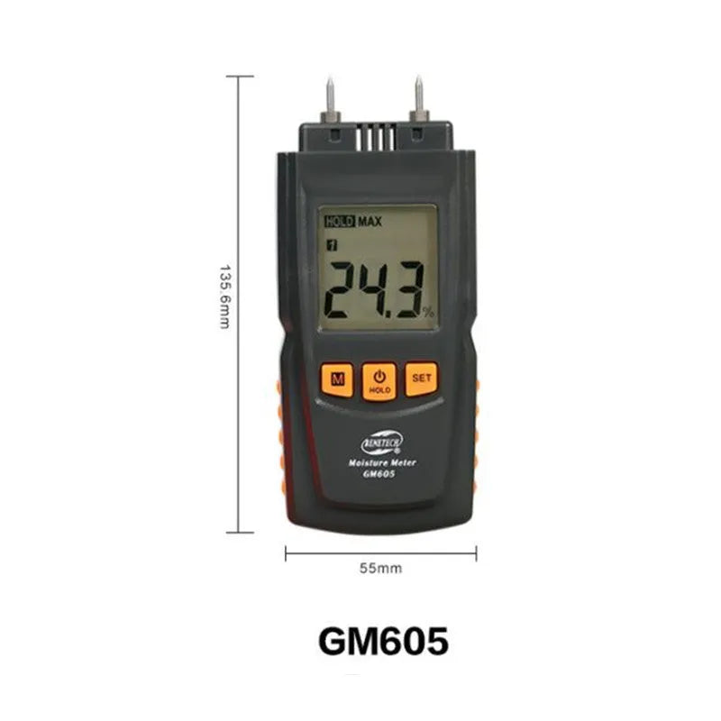 GM605 pin type wood moisture meter with black plastic casing and backlit LCD display