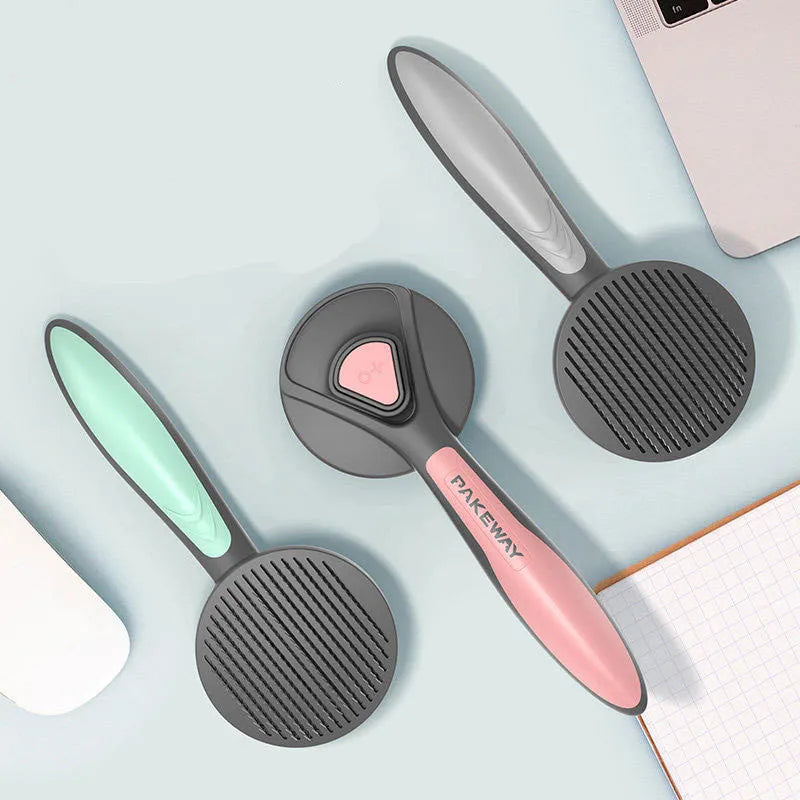 Pet floating hair combing brush in mint green, engineering plastic handle, 193mm length on white background